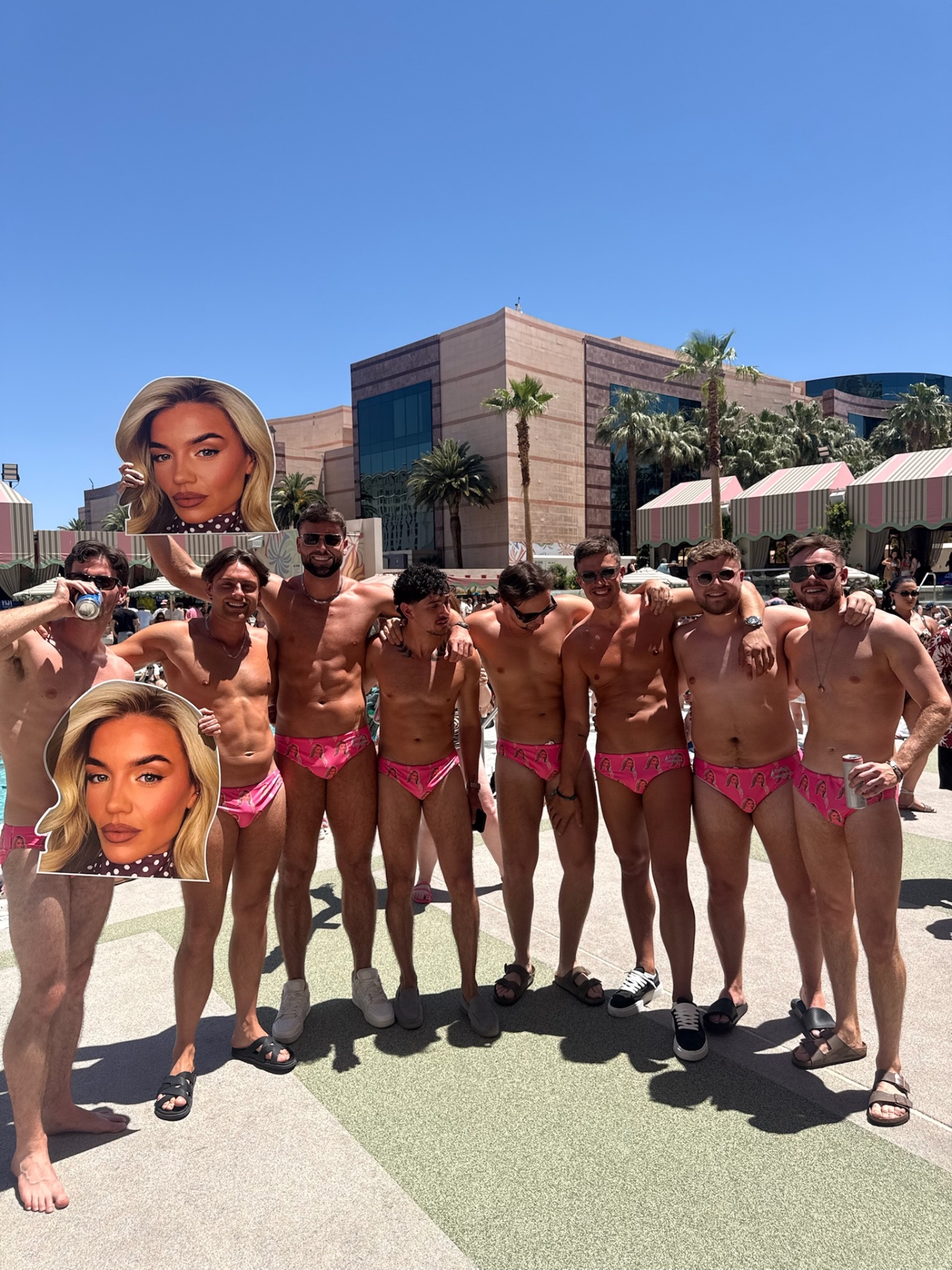The stag do crew in matching pink Budgy Smuggler speedos in Vegas